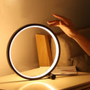 Luminária de mesa LED circular preta com controle por toque e três tonalidades de luz