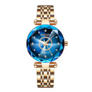 detalhes Relógio feminino dourado com pulseira metálica e mostrador facetado azul